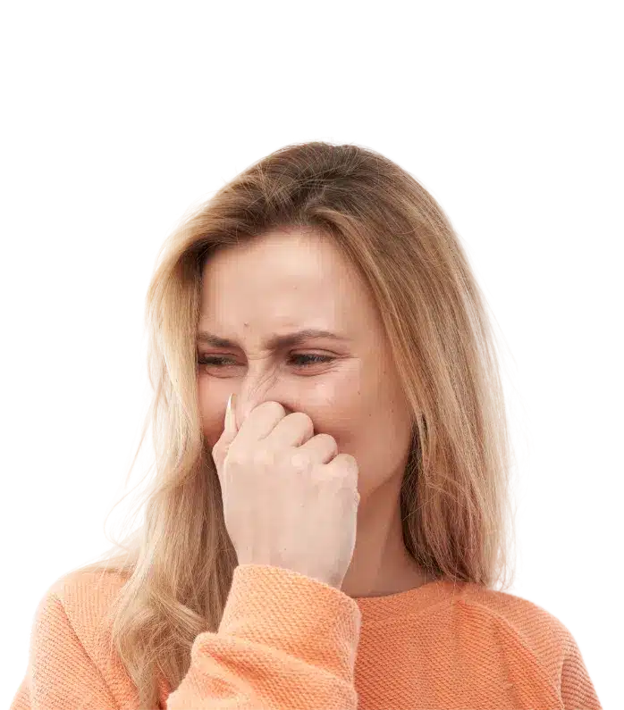 Woman holding her nose from a bad smell, representing pet waste odor issues solved by Oop Scoop in Delaware and Maryland.
